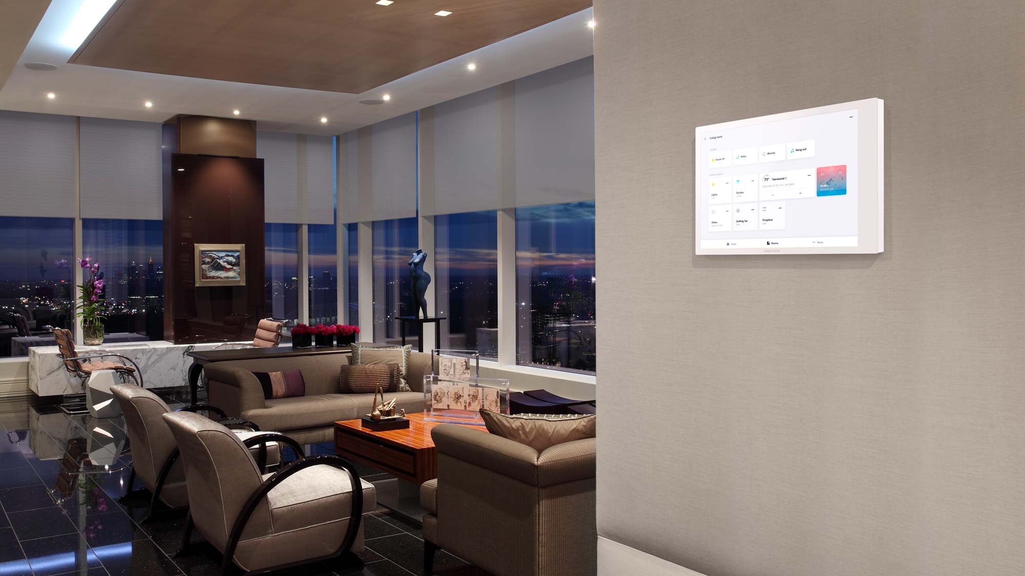 crestron touch panel on wall of condo residence with motorized shading
